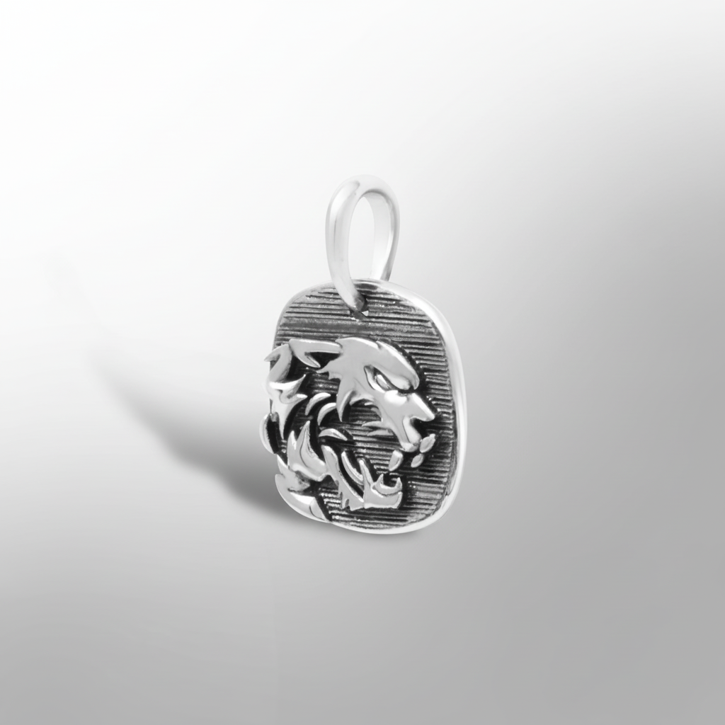 MCKER cheetah pendant angled view displaying dimensional details and textured sterling silver features
