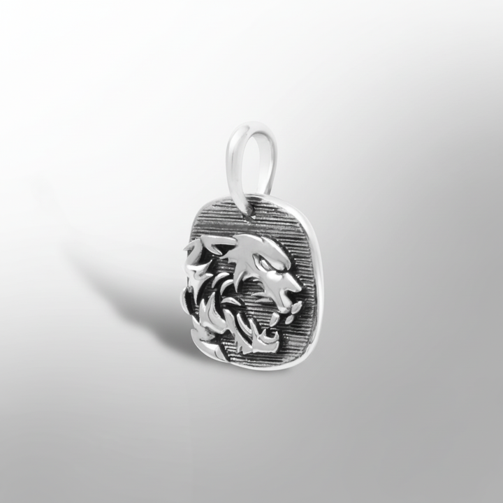 MCKER cheetah pendant angled view displaying dimensional details and textured sterling silver features