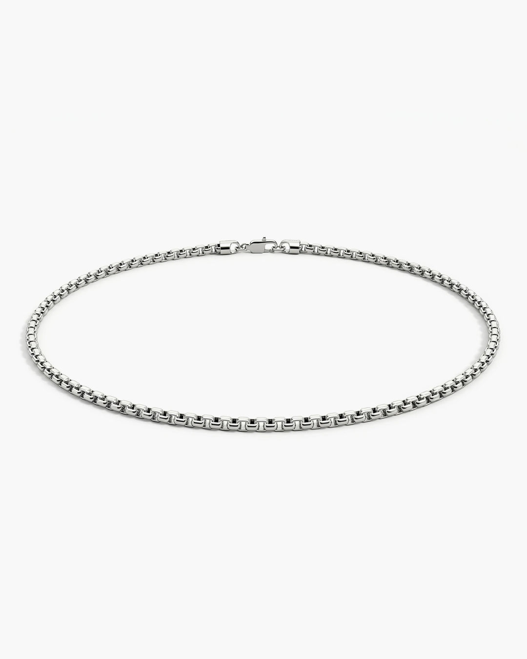Men’s 1.6mm sterling silver box chain bracelet shown from a side angle.