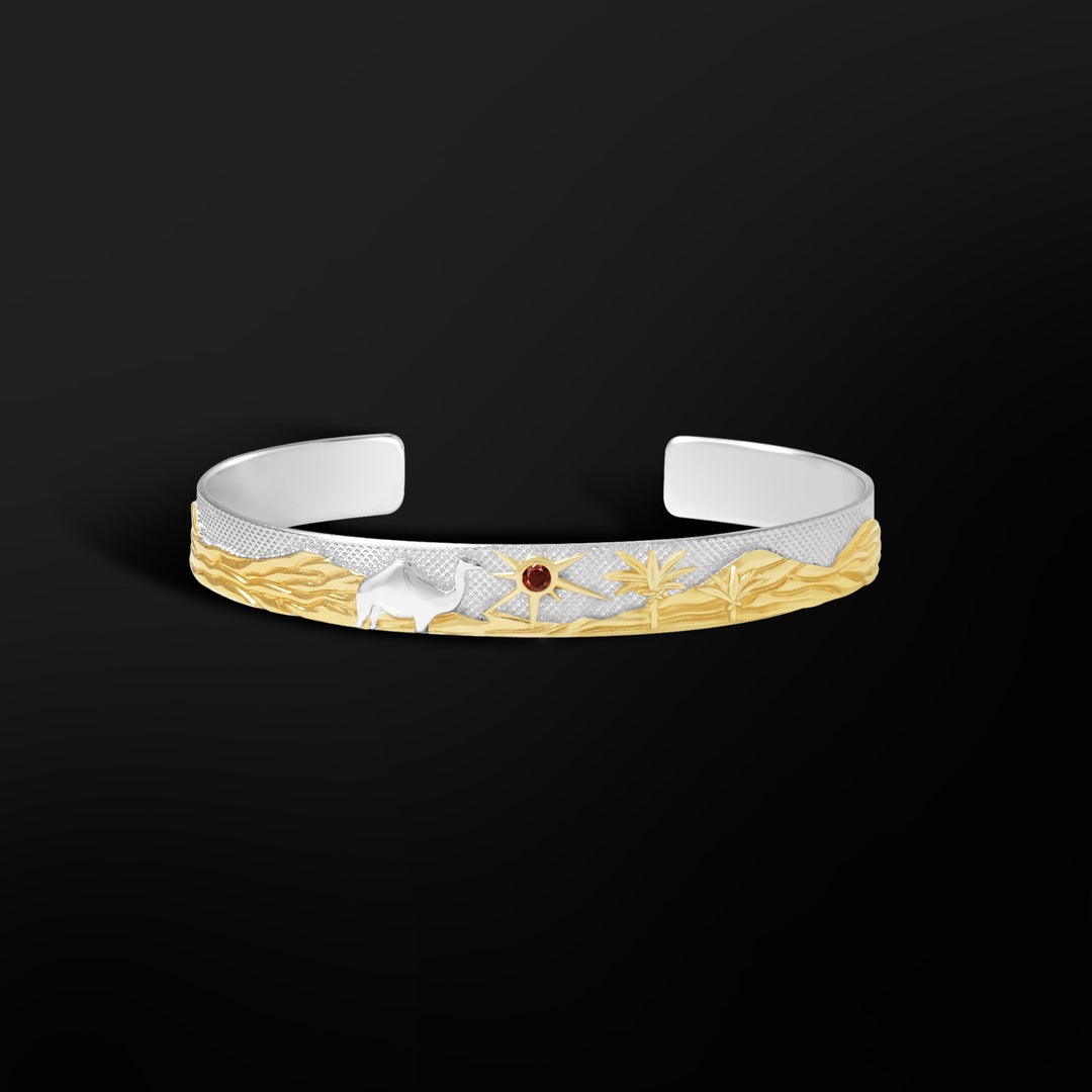 MCKER Sahara Cuff in sterling silver with 18K gold desert motifs and 3mm red garnet sun.
