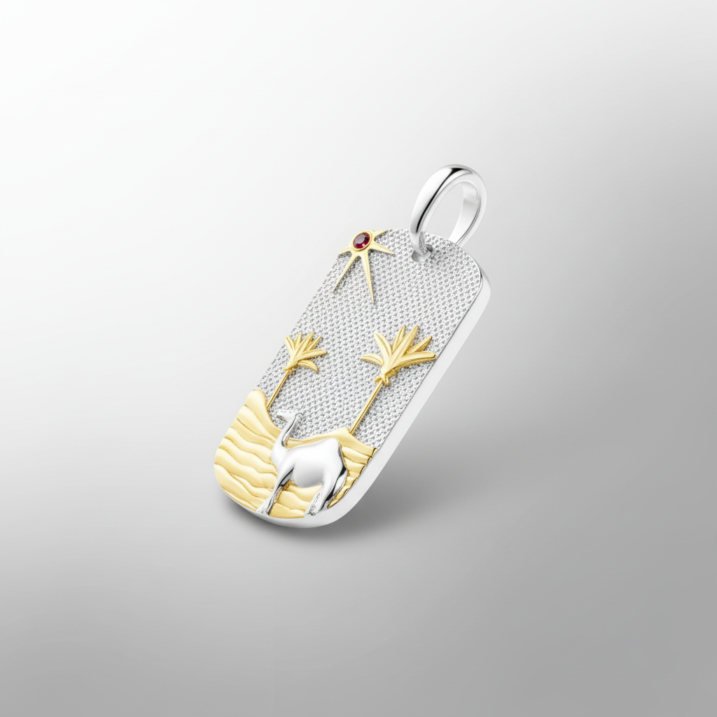 Dynamic view of MCKER Sahara pendant showing depth and dimension of sterling silver and 18K gold desert design