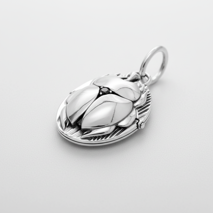 Close-up of MCKER scarab pendant highlighting intricate Egyptian scarab beetle details and premium silver craftsmanship.