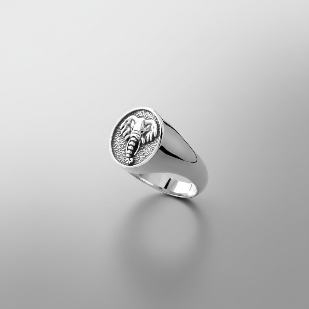 MCKER tusked sterling silver ring dramatic upright angle highlighting tusk features and band profile