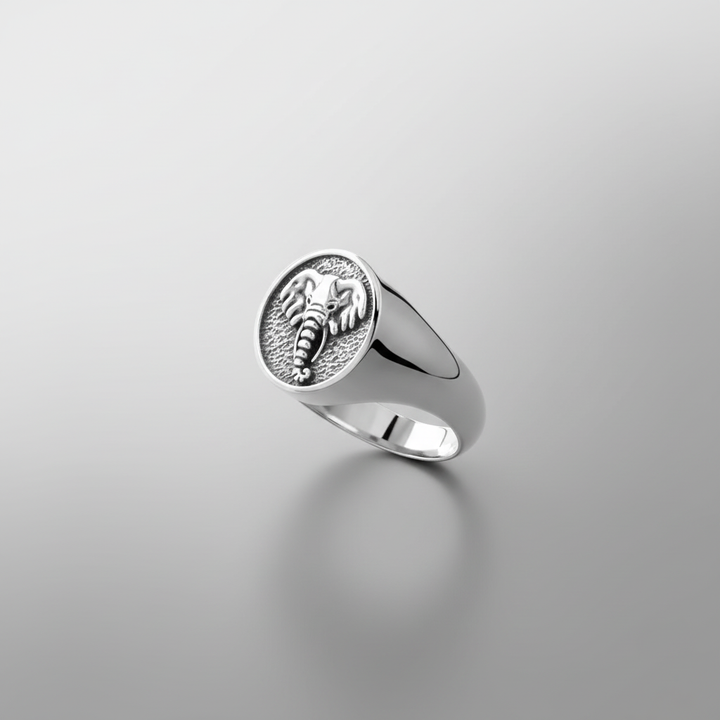 MCKER tusked sterling silver ring dramatic upright angle highlighting tusk features and band profile