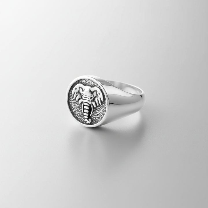 MCKER tusked ring three-quarter view displaying band profile and dimensional tusk details